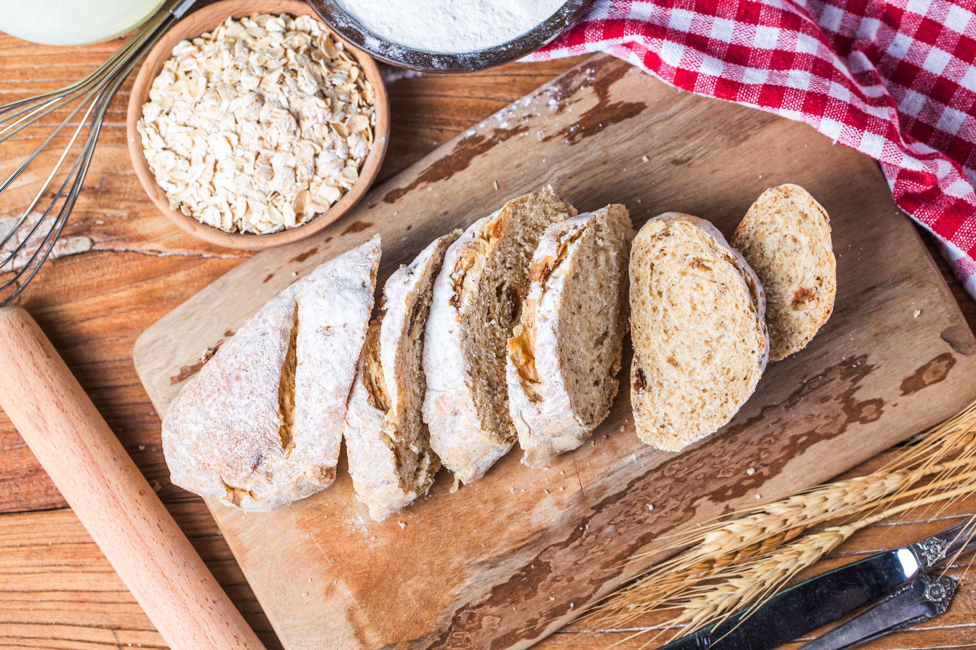 freshly-baked-traditional-bread-wooden-table-oatmeal-bread.jpg