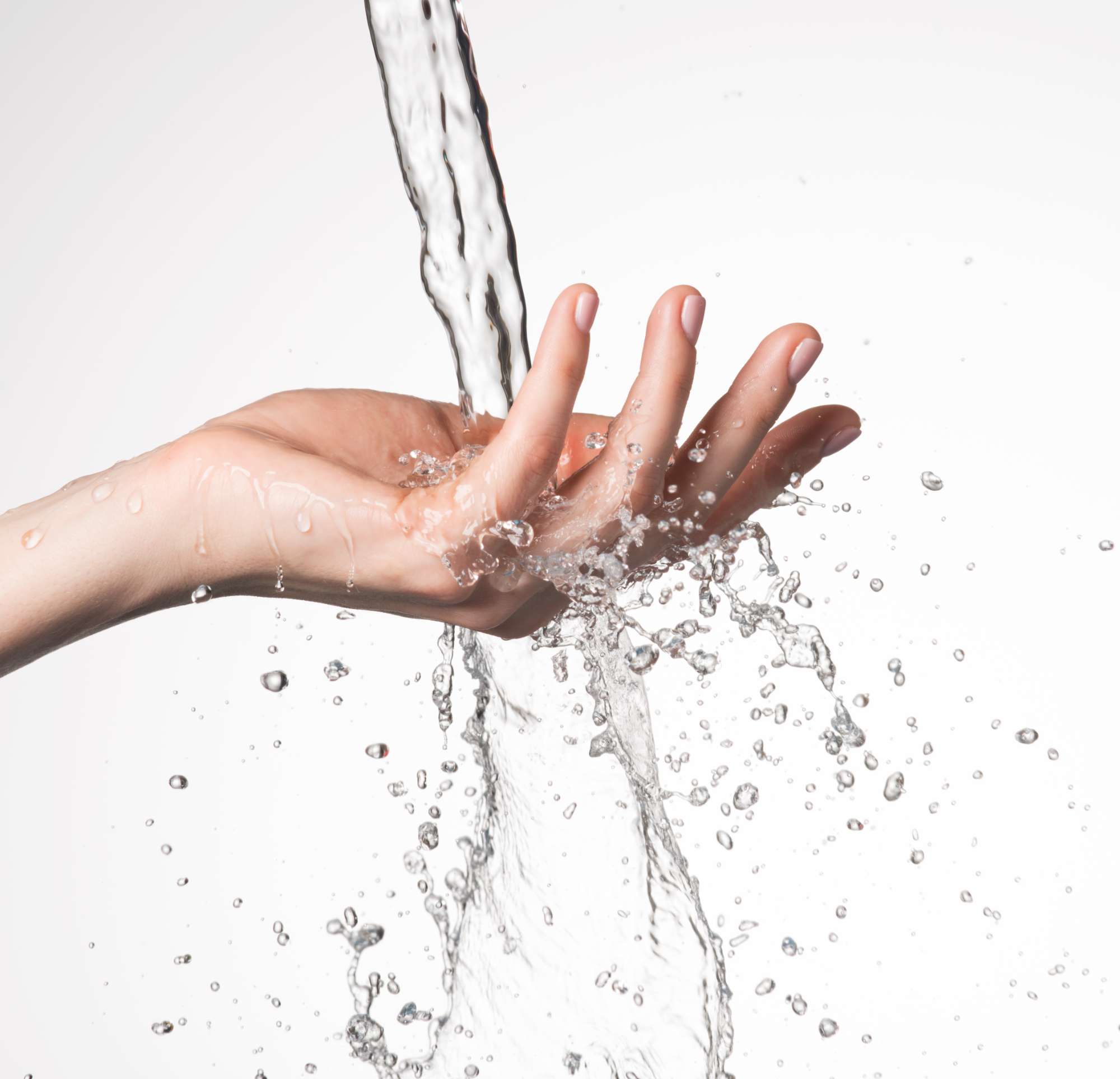 closeup-woman-hand-stream-splashing-water-skin-care-concept.jpg