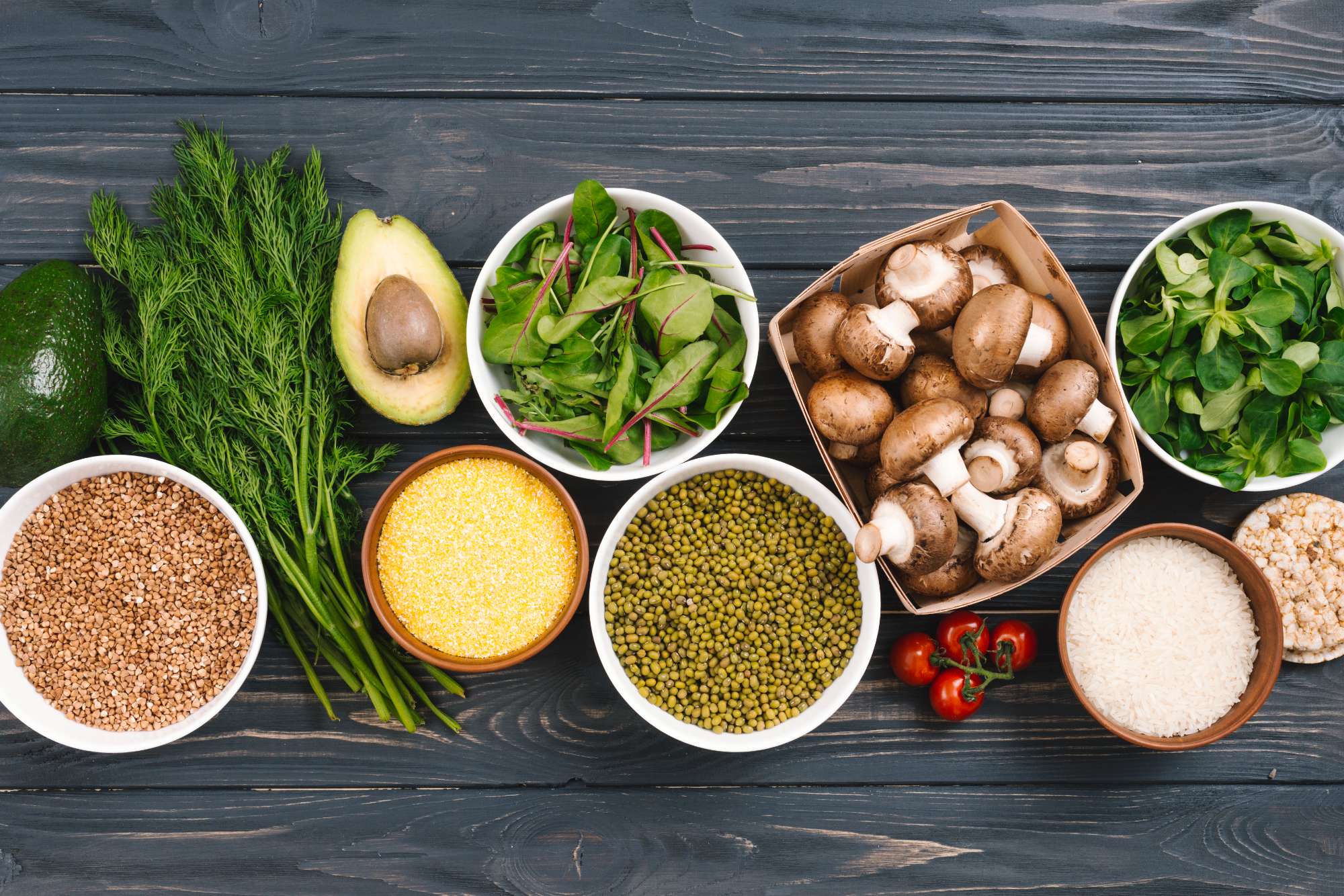 elevated-view-fresh-vegetables-pulses-black-wooden-desk.jpg