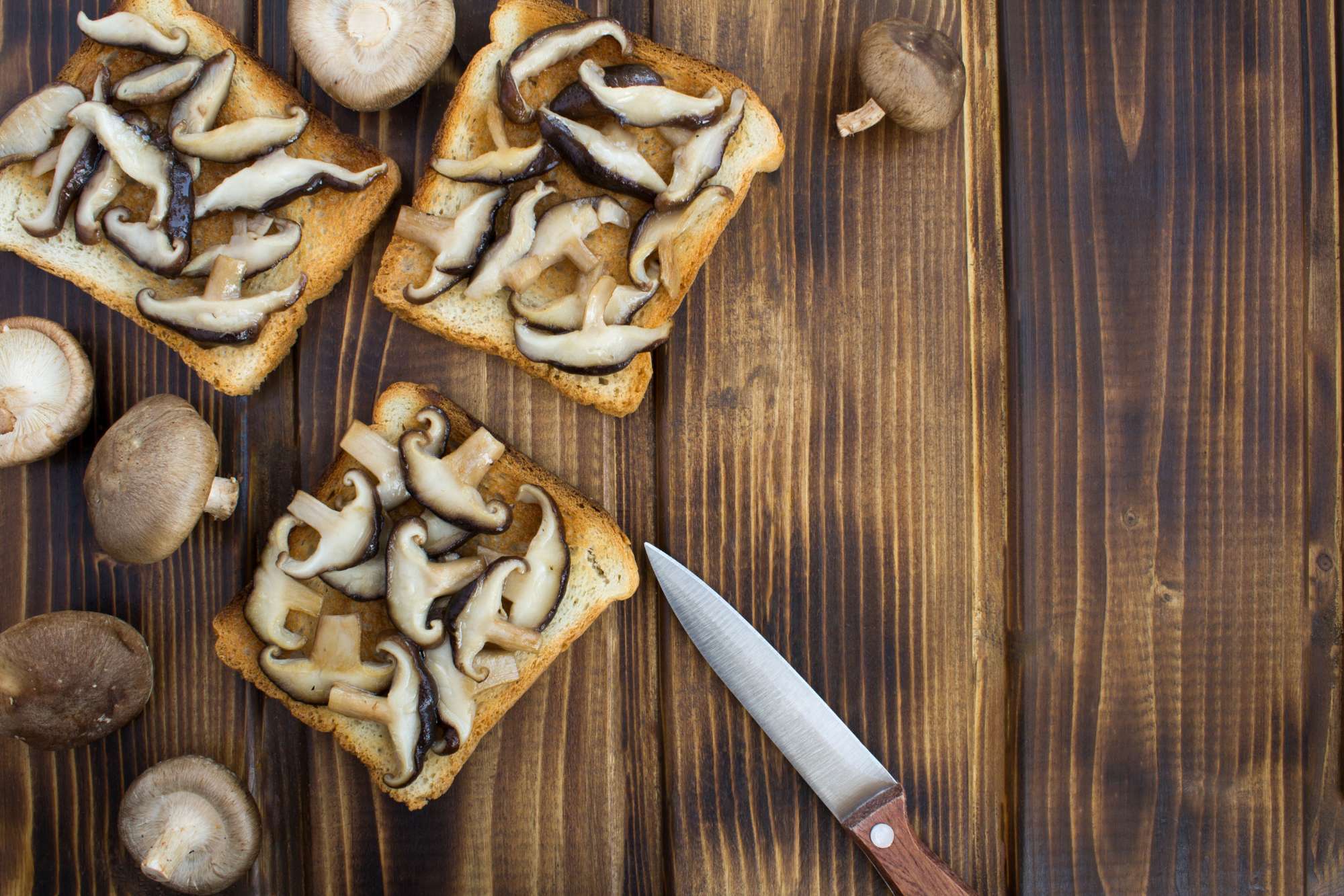 sandwiches-with-mushrooms-shiitake-brown-wooden-background-top-view-copy-space-healthy-food-ingredients.jpg