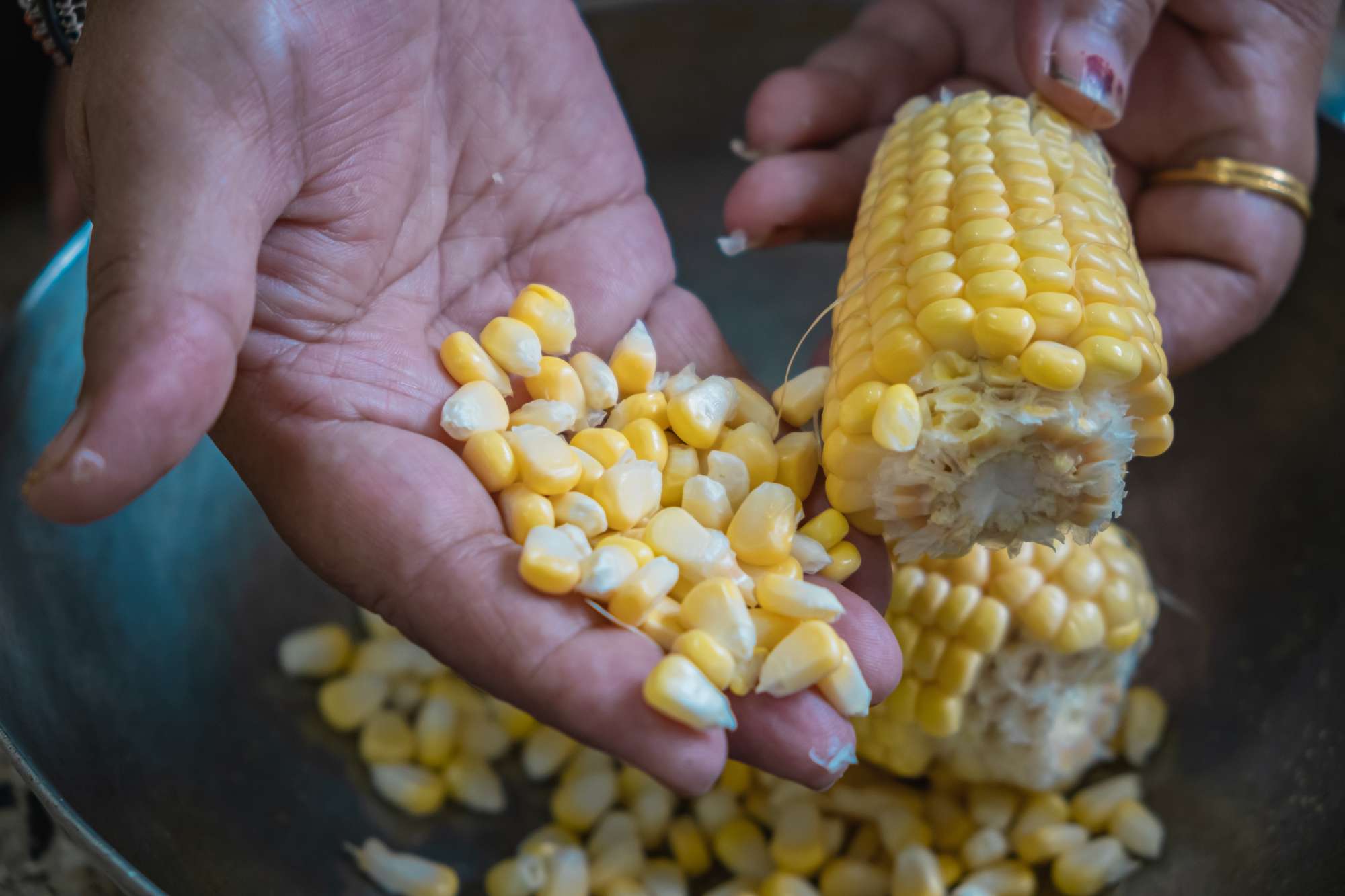 fresh-sweet-corn-grains-separating-from-corncob.jpg