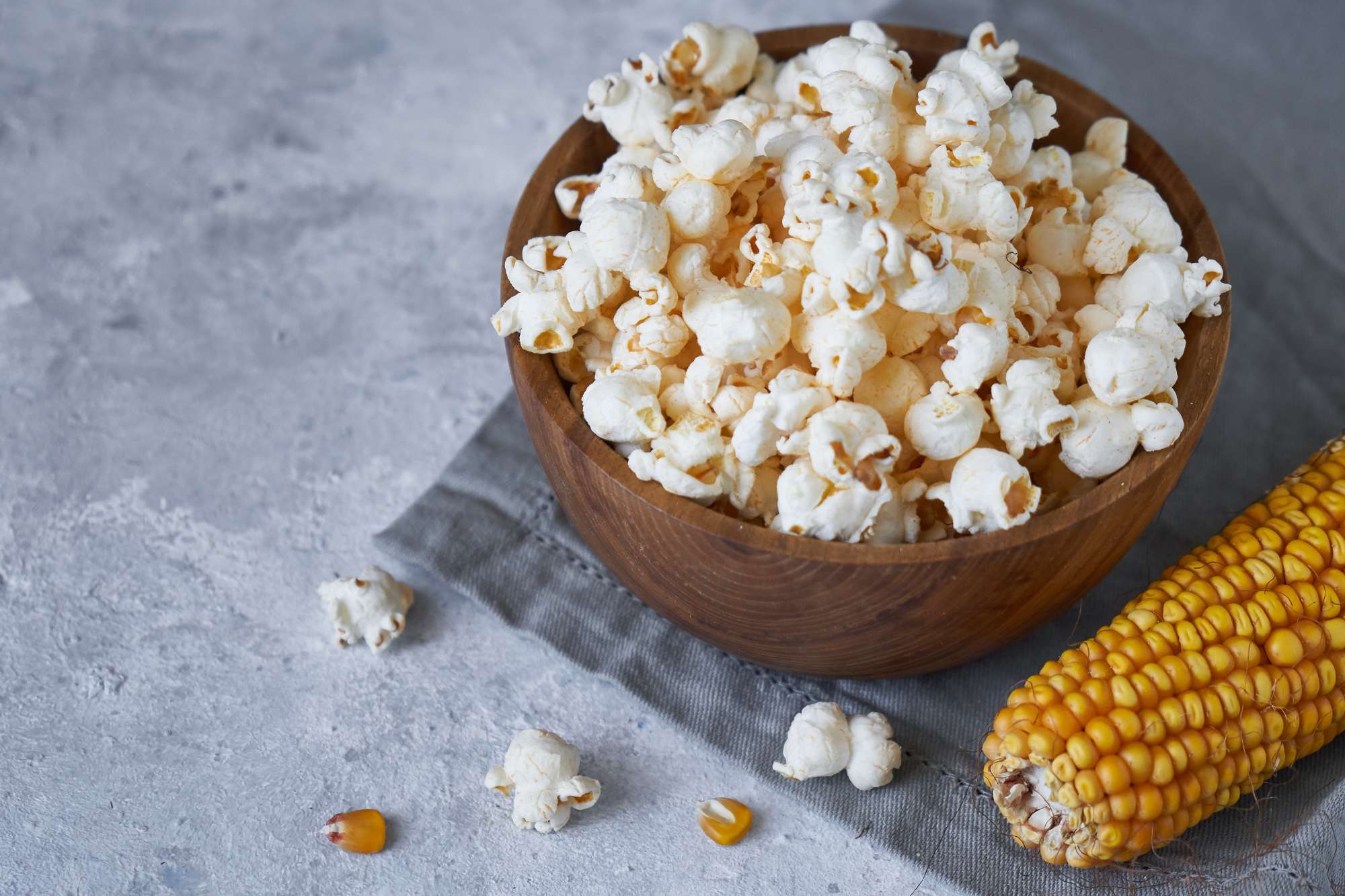 traditional-popcorn-wooden-bowl-corncobs-table.jpg