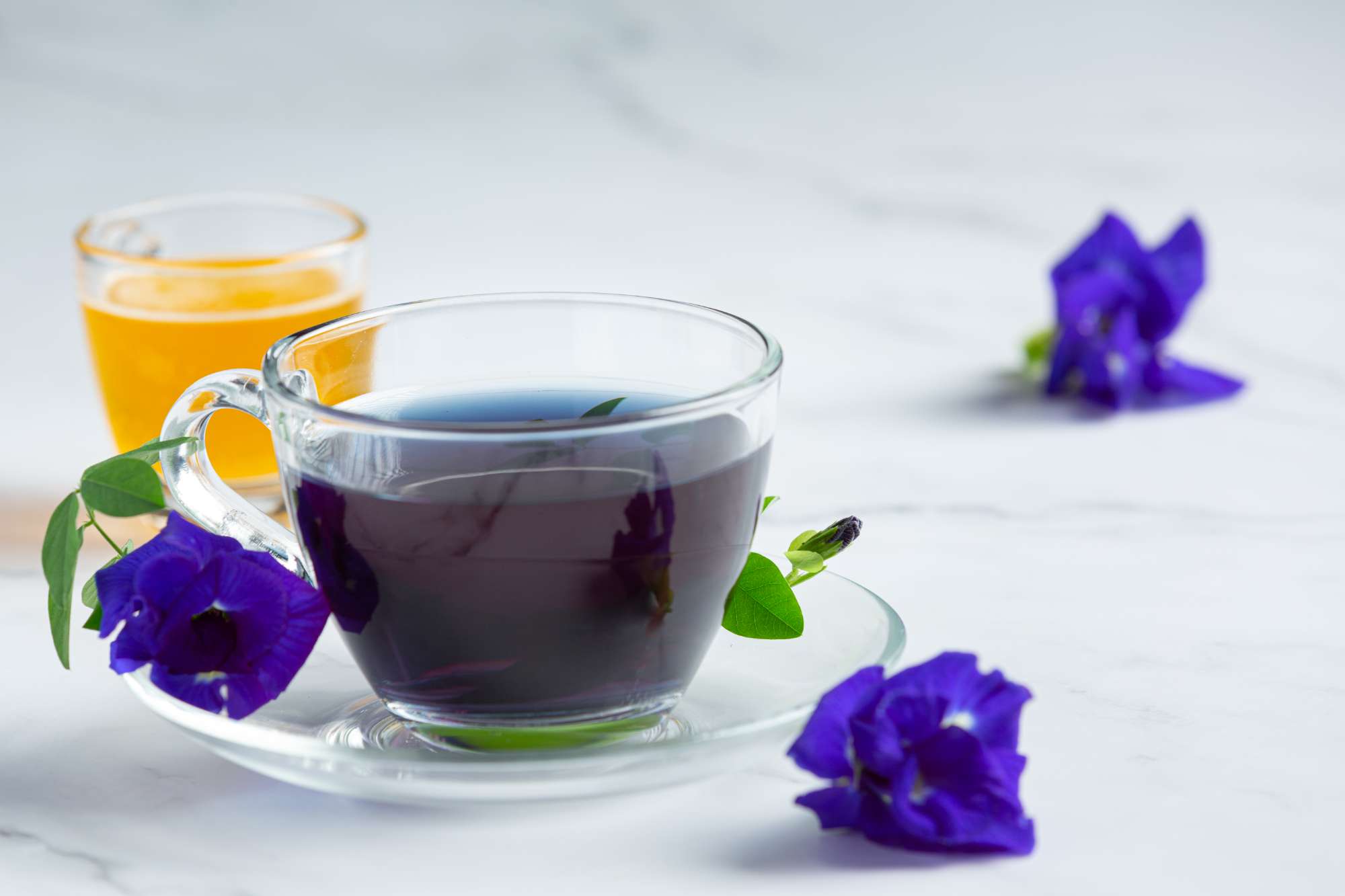 cup-butterfly-pea-flower-tea-with-honey-table-(1).jpg