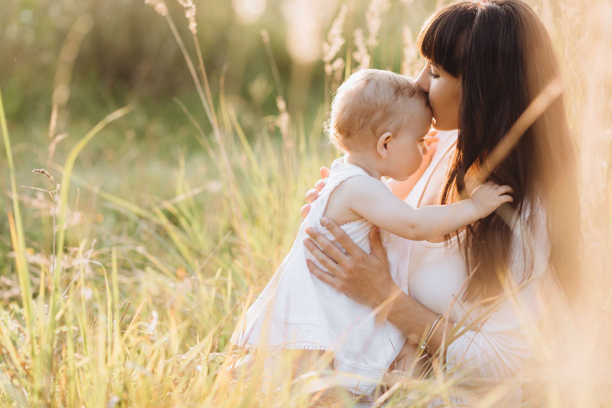 beautiful-portrait-charming-mother-lovely-little-daughter-walking-across-field.jpg