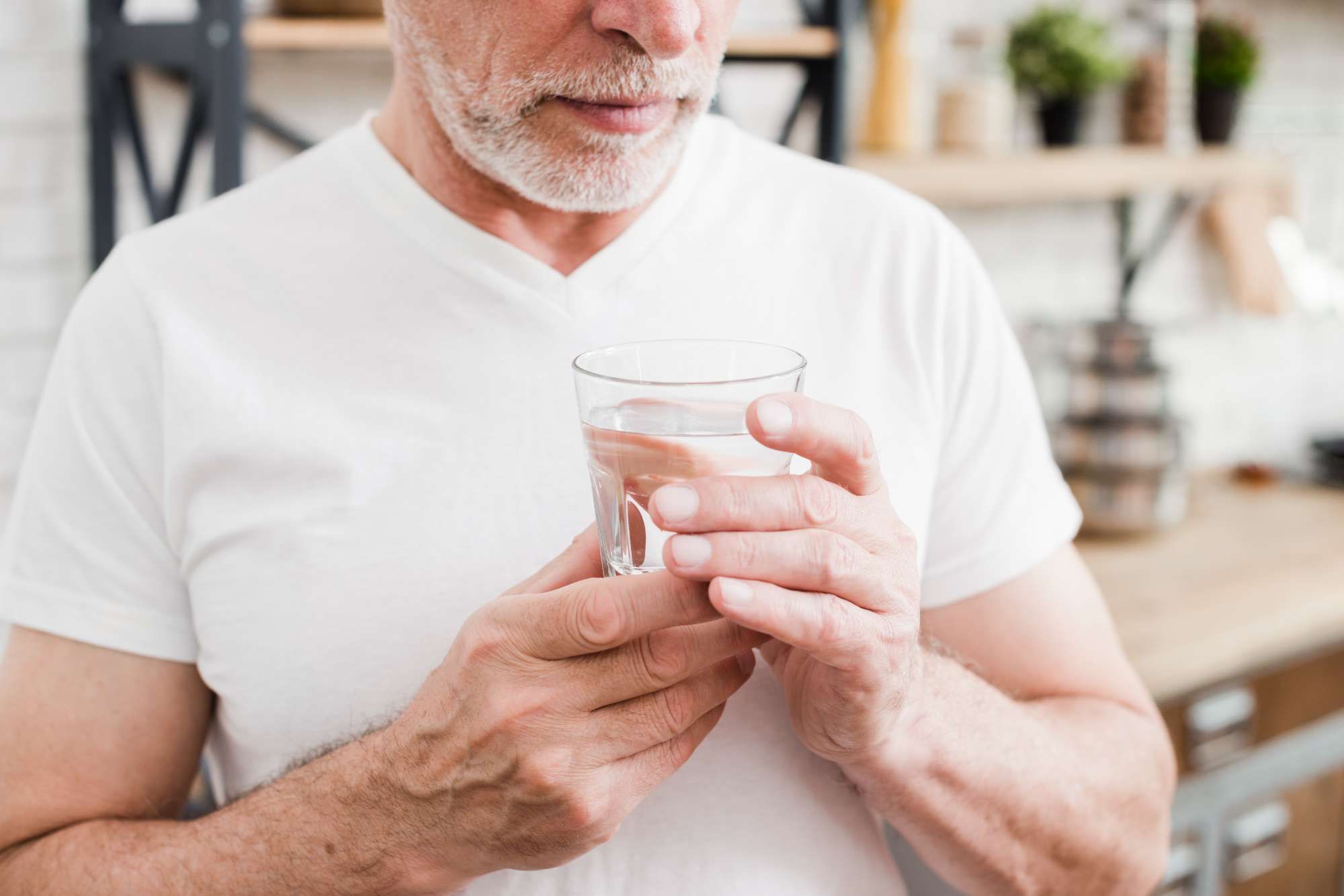 elder-man-having-his-medicines.jpg