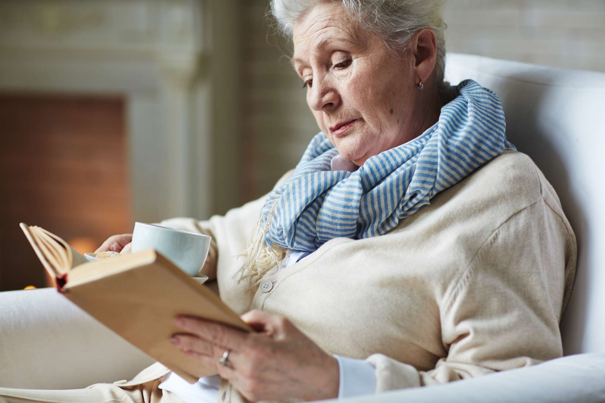 pretty-senior-woman-reading-book.jpg