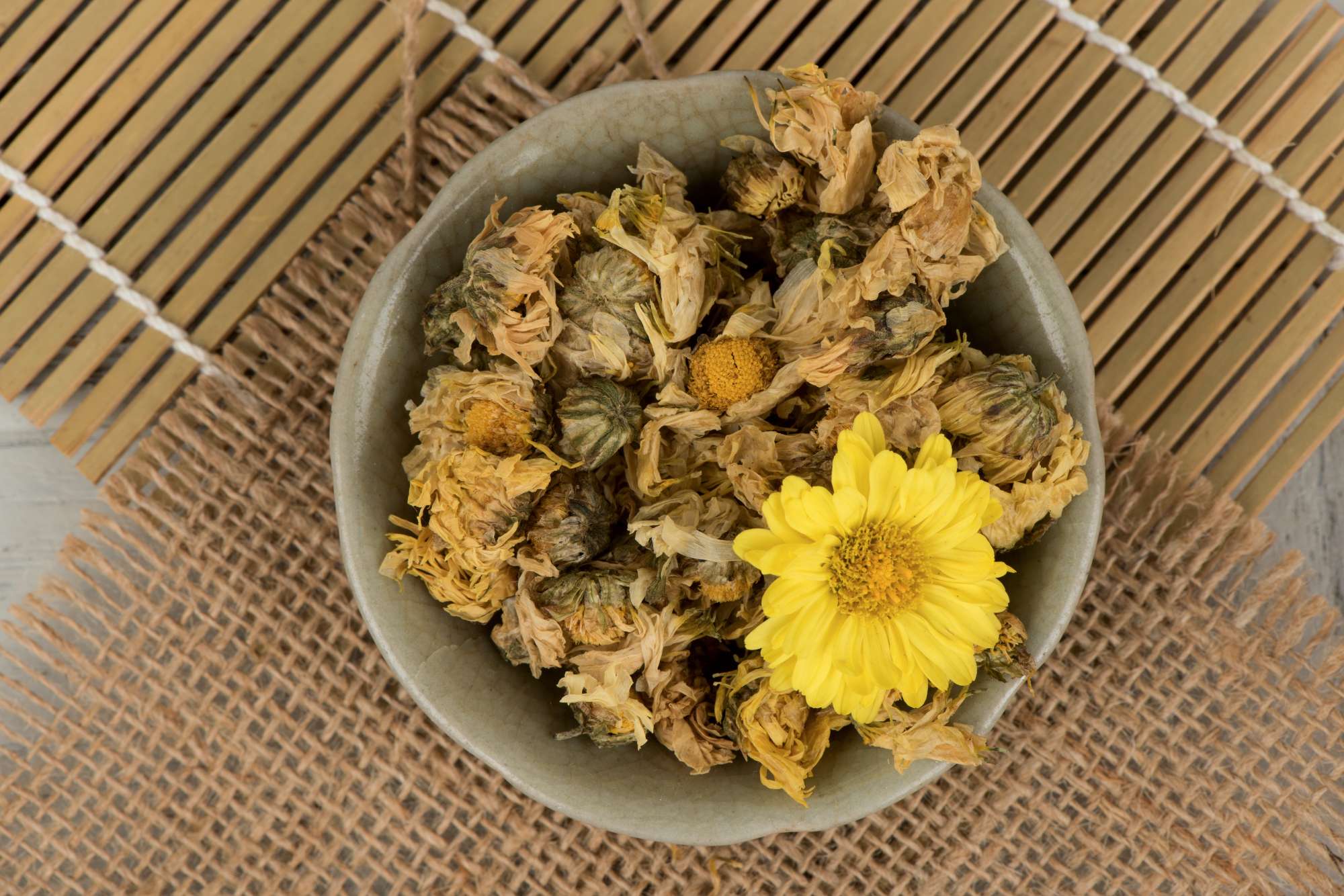 fresh-dried-chrysanthemum-flowers-wood-background.jpg