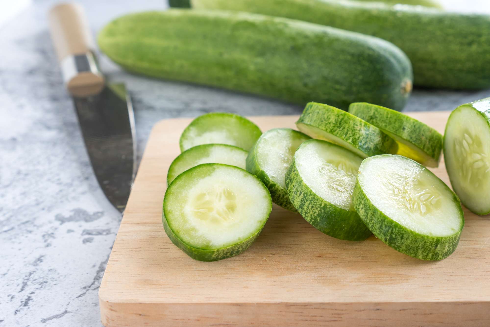 fresh-cucumber-slices-cutting-board.jpg