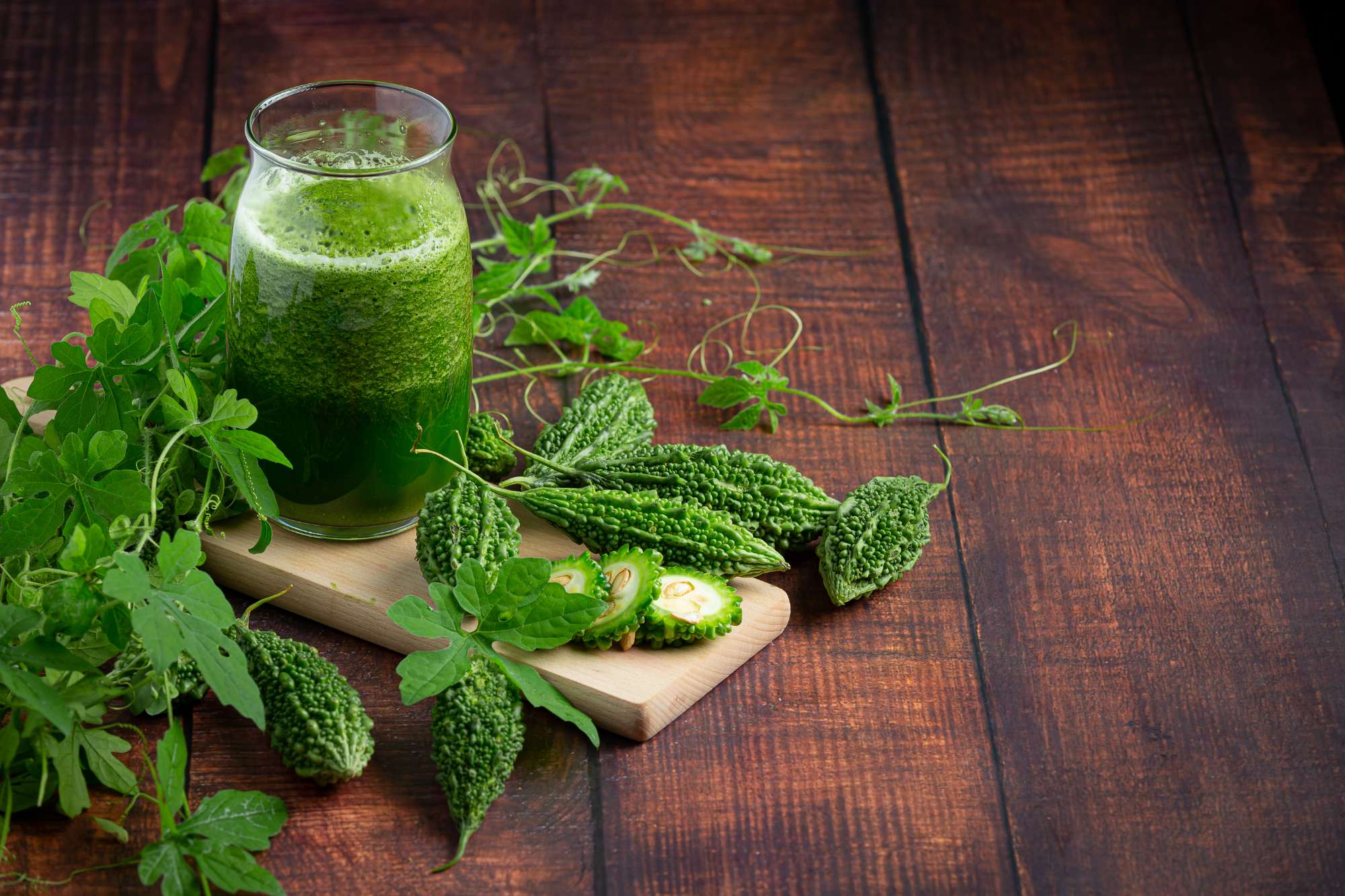 jug-bitter-gourd-smoothie-with-raw-bitter-gourd-put-wooden-board.jpg