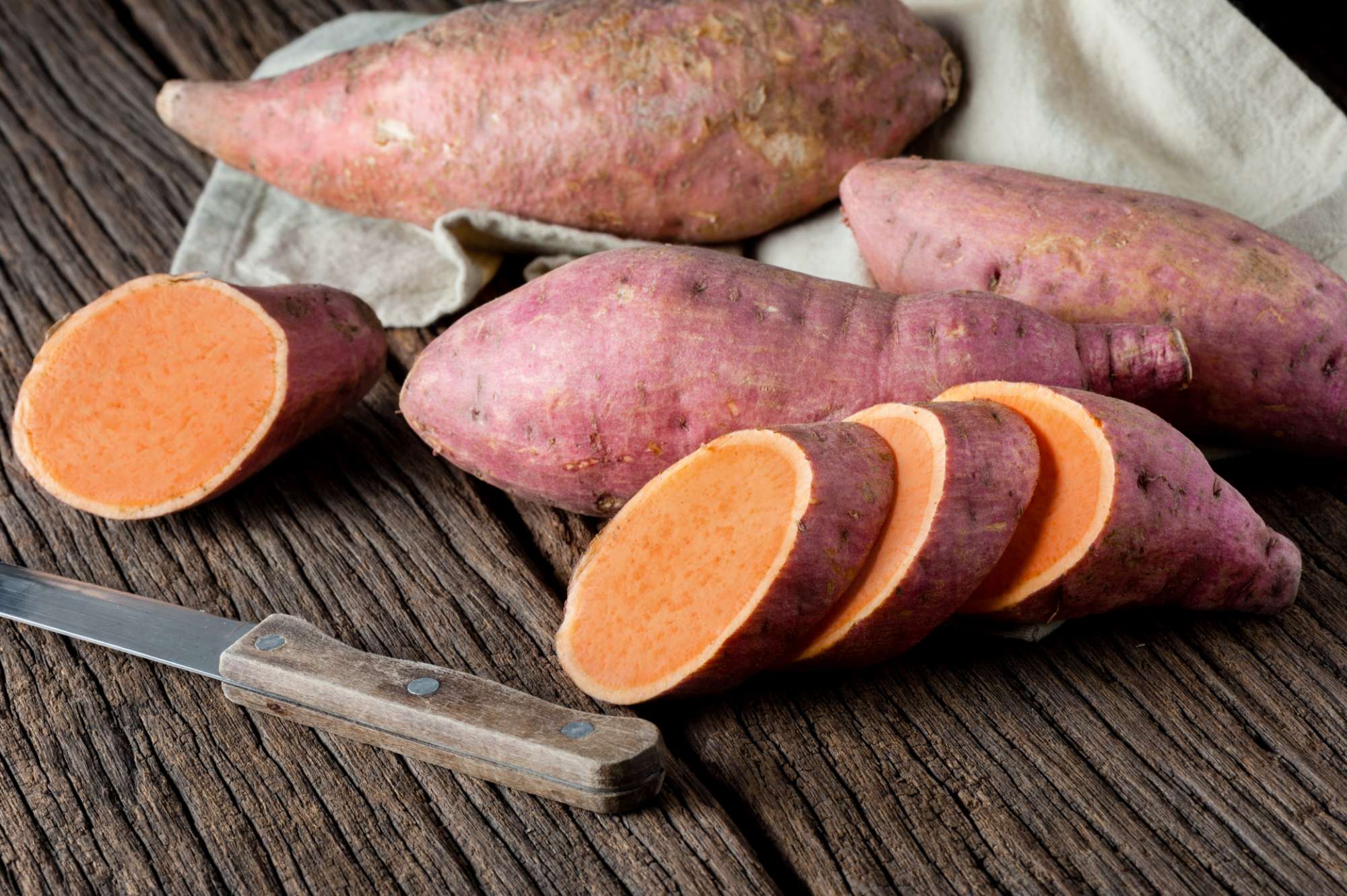 raw-sweet-potatoes-wooden-table-(1).jpg