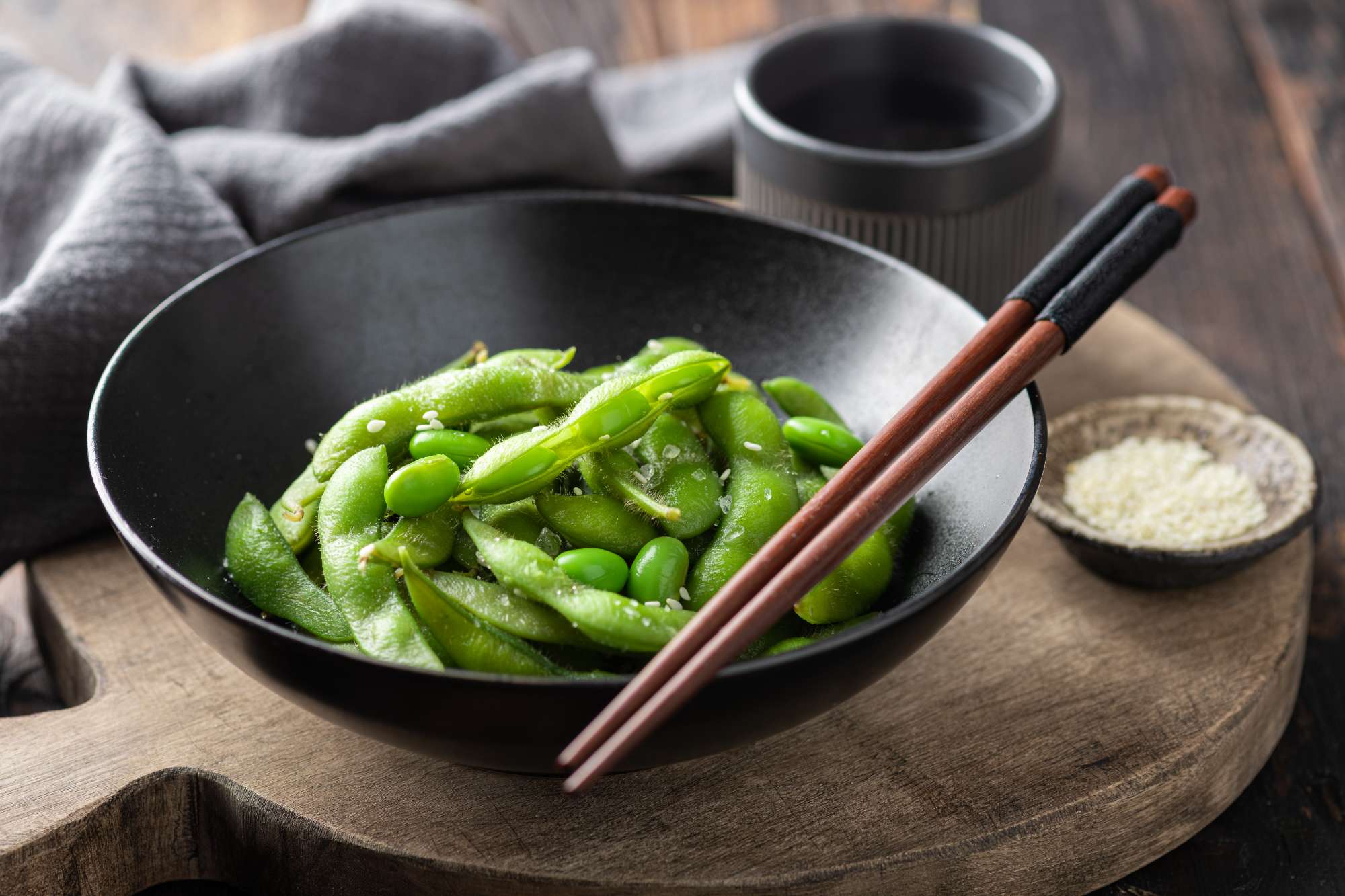 steamed-edamame-beans-black-ceramic-bowl-soybeans-selective-focus.jpg