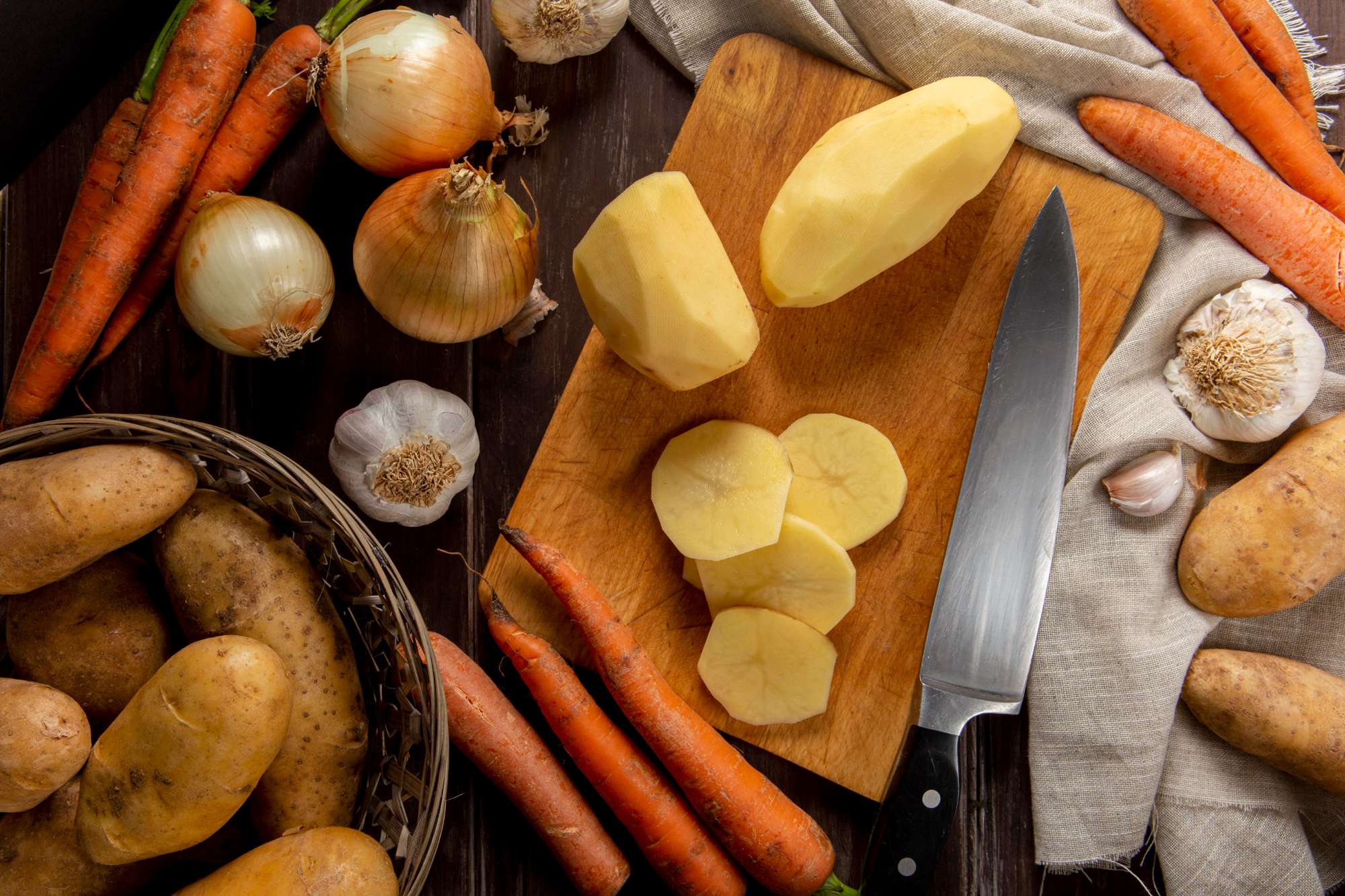 top-view-peeled-potatoes-with-garlic-onion.jpg