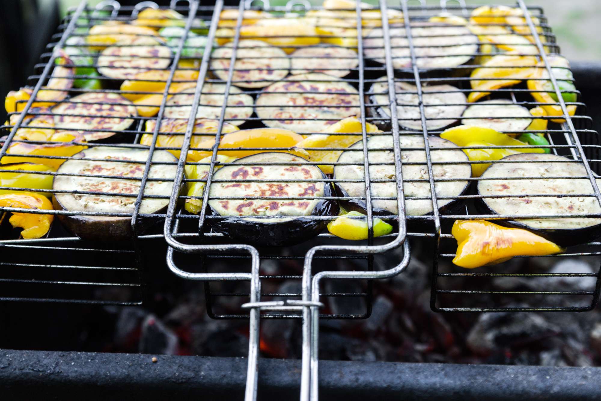 vegetables-barbecue-grill-closeup-peppers-eggplants-iron-grate-horizontal-photo.jpg