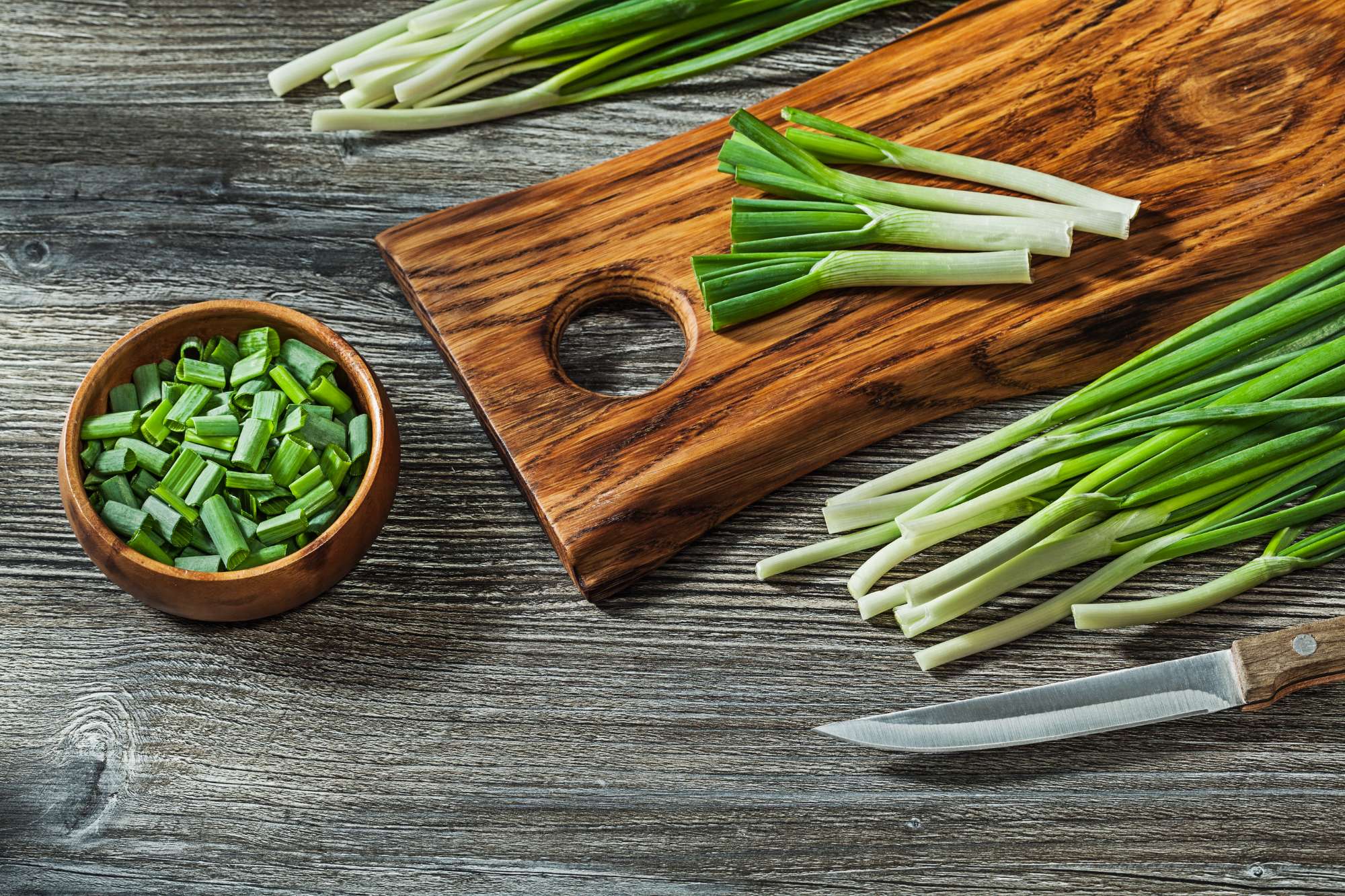 chopped-green-onions-vintage-wooden-chopping-bard-kitchen-knife.jpg