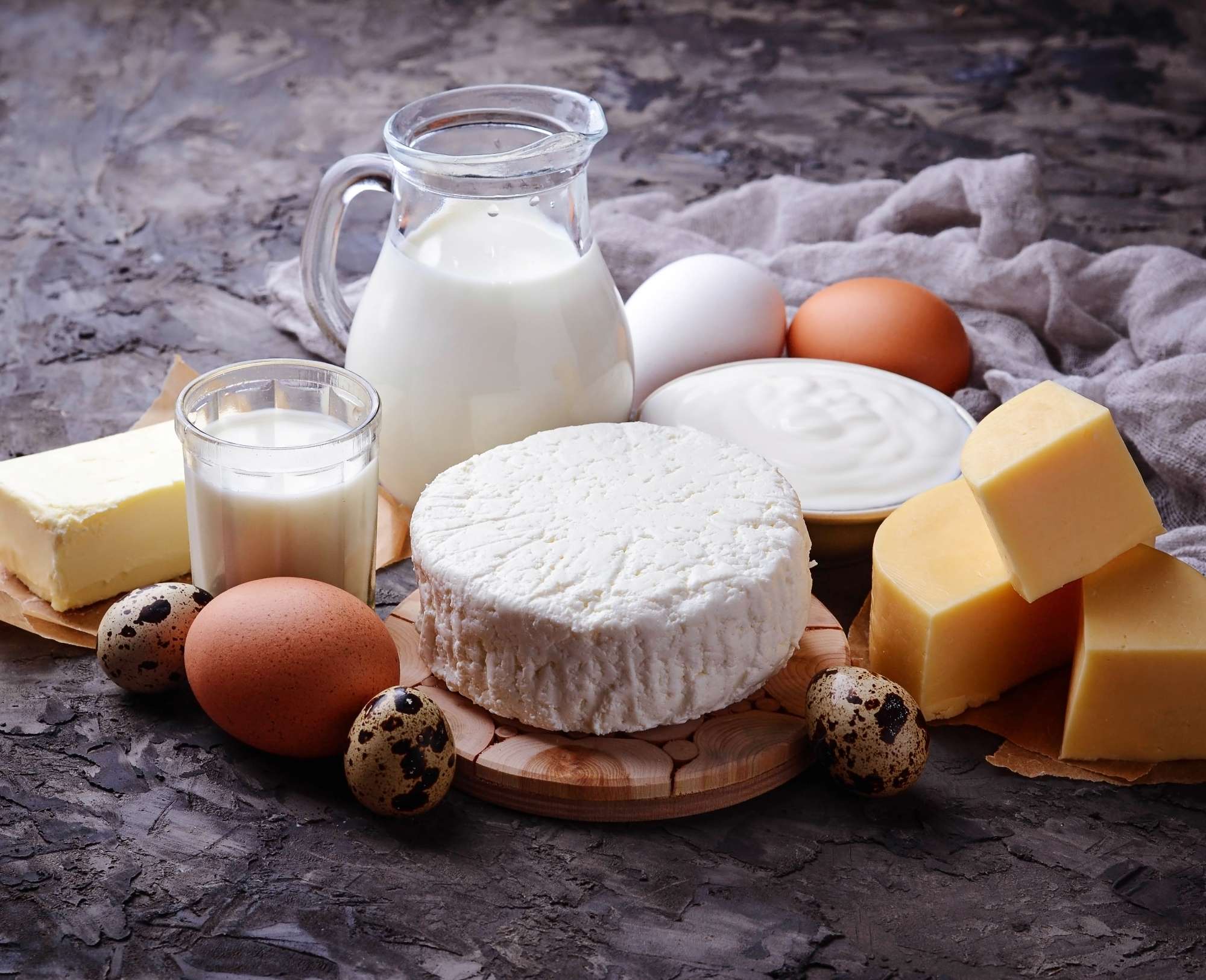 dairy-products-milk-cottage-cheese-sour-cream-butter-eggs-selective-focus.jpg